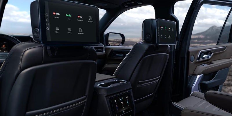 2026 GMC SUV interior with rear entertainment screens